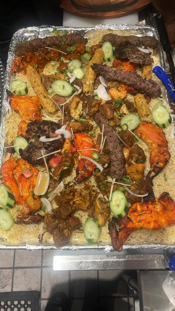 Large Halal Pakistani platter featuring assorted Tandoori meats and kebabs.