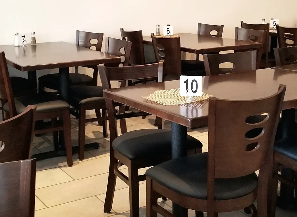 Clean indoor dining area at Karahi House SF ready for corporate lunch service.